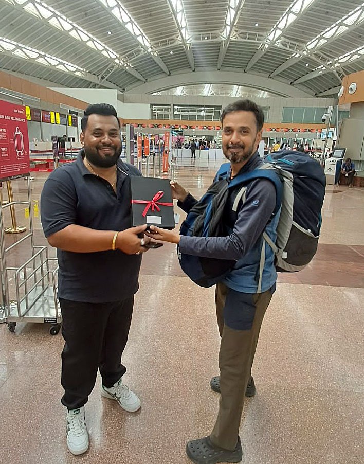 The trophy, handed over at the airport.